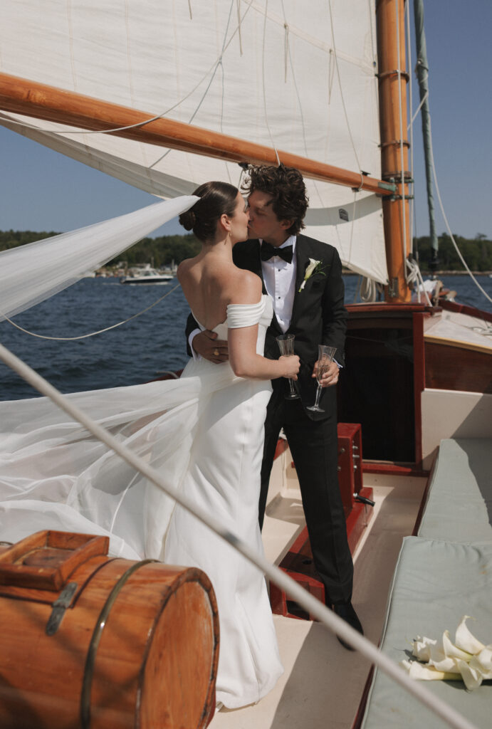 Maine bride and groom on a sailboat.