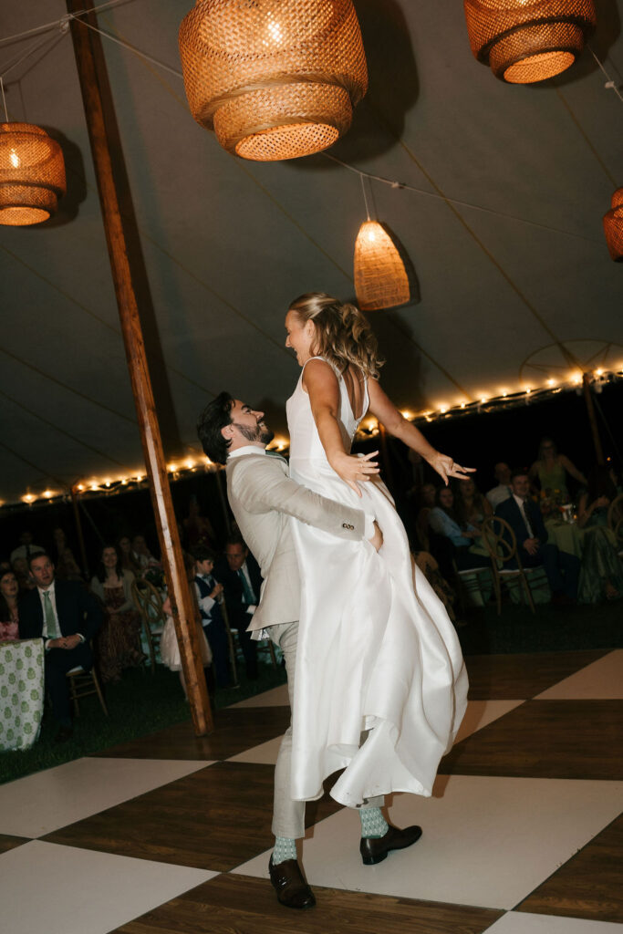 Couples first dance at their tented wedding. 