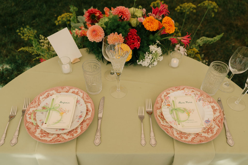 Vintage plates at a tented wedding in Kennebunk, Maine. 
